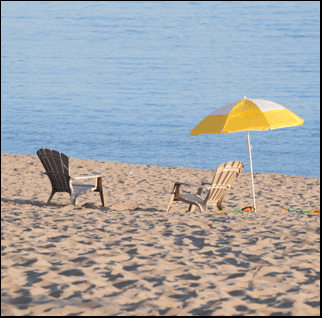 Photograph of chairs on Long Point Beach, investment property on the Gold Coast of Ontario, on Lake Erie