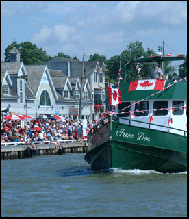 Port Dover Pier and Canada Day boat parade, real estate investment property for sale from the MLS on the Gold Coast in southern Ontario